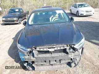 2013 Ford Fusion SE Hybrid with VIN 3FA6P0LUXDR375099, listed as a IAAI auction lot 41914387 with 133,178 mi miles. Bid and sale history available at carsss.com. Image 12.