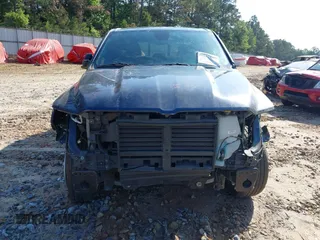 2019 Ram 1500 Big Horn z VIN 1C6RRFFG0KN909003, wystawiony jako IAAI lot #39513660 z przebiegiem 84 291 mil mil oraz . Historia ofert i sprzedaży dostępna na DreamBid. Obrazek 13.