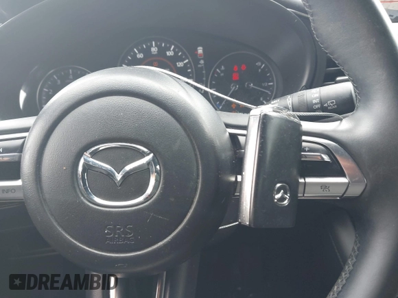 2019 Mazda 3 z VIN JM1BPAJM7K1133105, wystawiony jako IAAI lot #42473214 z przebiegiem 47 751 mil mil oraz . Historia ofert i sprzedaży dostępna na DreamBid. Obrazek 11.
