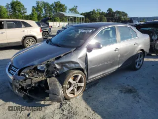 2009 Volkswagen Jetta SE z VIN 3VWRM71K99M149776, wystawiony jako Copart lot #57708825 z przebiegiem 147 655 mil mil oraz Szkoda całkowita • Salvage title. Historia ofert i sprzedaży dostępna na DreamBid. Obrazek 1.