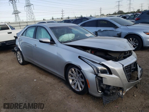2014 Cadillac CTS Luxury AWD with VIN 1G6AX5SX6E0140605, listed as a Copart auction lot 73649144 with Not Provided miles and Clean Title. Bid and sale history available at DreamBid. Image 4.