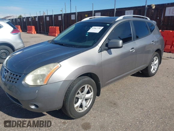 2009 Nissan Rogue S with VIN JN8AS58VX9W440060, listed as a IAAI auction lot 42067756 with 117,849 mi miles. Bid and sale history available at carsss.com. Image 2.