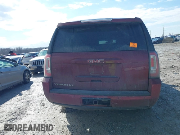 2019 GMC Yukon XL SLT with VIN 1GKS2GKC9KR341807, listed as a IAAI auction lot 41658848 with 68,204 mi miles. Bid and sale history available at carsss.com. Image 16.