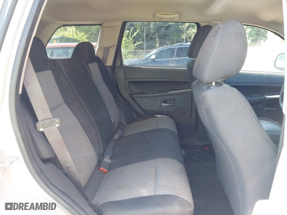 2009 Jeep Grand Cherokee Laredo with VIN 1J8GS48K99C528145, listed as a IAAI auction lot 42077024 with 167,588 mi miles. Bid and sale history available at carsss.com. Image 8.