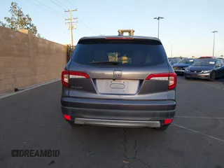 2021 Honda Pilot EX-L with VIN 5FNYF5H54MB018846, listed as a IAAI auction lot 41208987 with 80,757 mi miles and . Bid and sale history available at DreamBid. Image 16.