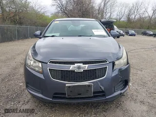 2014 Chevrolet Cruze 1LT with VIN 1G1PC5SB0E7213216, listed as a IAAI auction lot 41955710 with 147,003 mi miles. Bid and sale history available at carsss.com. Image 12.