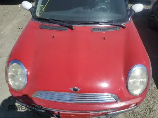 2004 MINI Hardtop with VIN WMWRC33474TJ53569, listed as a Copart auction lot 72429454 with 154,713 mi miles and Salvage Title. Bid and sale history available at DreamBid. Image 11.