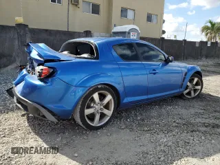 2006 Mazda RX-8 with VIN JM1FE173260203112, listed as a Copart auction lot 85824464 with 112,776 mi miles and Salvage Title. Bid and sale history available at carsss.com. Image 3.