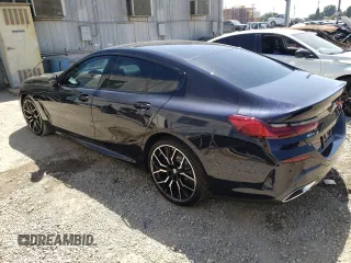 2023 BMW 8 Series 840i with VIN WBAGV4C09PCL74759, listed as a Copart auction lot 68104644 with 5,753 mi miles and Salvage Title. Bid and sale history available at carsss.com. Image 2.