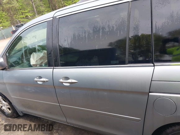 2006 Honda Odyssey EX with VIN 5FNRL38406B066176, listed as a IAAI auction lot 42028052 with 136,305 mi miles and . Bid and sale history available at DreamBid. Image 15.