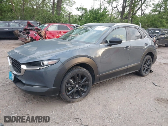 2023 Mazda CX-30 S Carbon Edition with VIN 3MVDMBCM4PM577619, listed as a IAAI auction lot 42219801 with 24,784 mi miles and . Bid and sale history available at DreamBid. Image 17.