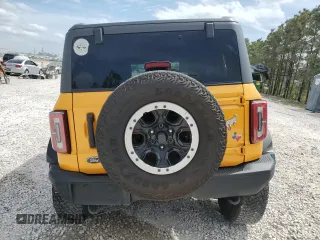 2022 Ford Bronco z VIN 1FMEE5DH2NLB68468, wystawiony jako Copart lot #53645805 z przebiegiem 25 411 mil mil oraz Szkoda całkowita • Salvage title. Historia ofert i sprzedaży dostępna na DreamBid. Obrazek 6.