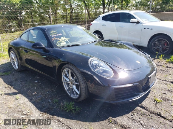 2018 Porsche 911 Carrera z VIN WP0AA2A93JS106166, wystawiony jako Copart lot #51105893 z przebiegiem 11 476 mil mil oraz . Historia ofert i sprzedaży dostępna na DreamBid. Obrazek 4.