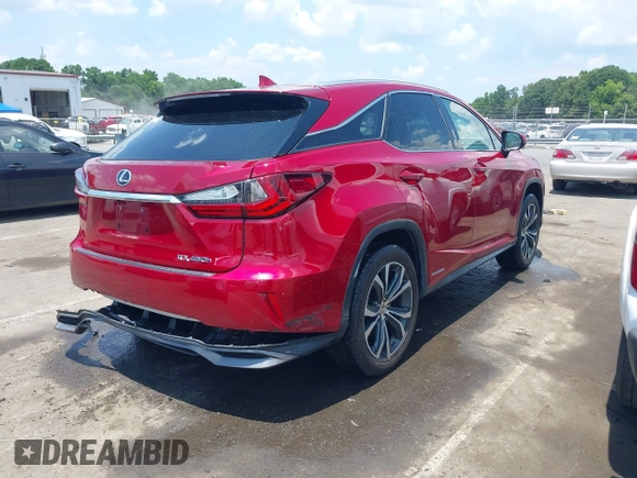 2016 Lexus RX 450h with VIN 2T2BGMCA1GC007583, listed as a IAAI auction lot 42590022 with 152,810 mi miles and . Bid and sale history available at DreamBid. Image 4.
