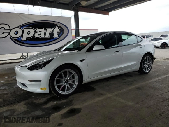 2021 Tesla Model 3 Standard Range Plus z VIN 5YJ3E1EA1MF072130, wystawiony jako Copart lot #53911095 z przebiegiem 35 075 mil mil oraz Szkoda całkowita • Salvage title. Historia ofert i sprzedaży dostępna na DreamBid. Obrazek 1.