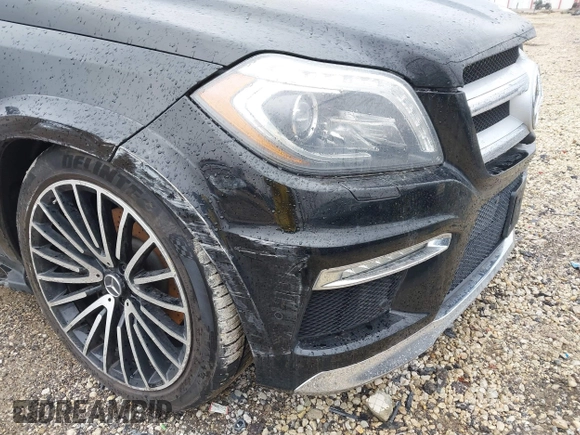 2014 Mercedes-Benz GL-Class GL 550 with VIN 4JGDF7DE1EA274612, listed as a IAAI auction lot 41710174 with 105,094 mi miles. Bid and sale history available at carsss.com. Image 6.