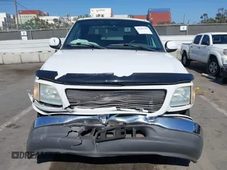 2003 Ford F-150 XLT with VIN 1FTRW07653KC82984, listed as a IAAI auction lot 42282305 with 933,470 mi miles and . Bid and sale history available at DreamBid. Image 12.