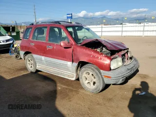 2001 Chevrolet Tracker LT z VIN 2CNBJ634716945832, wystawiony jako Copart lot #61967345 z przebiegiem 136 403 mil mil oraz Szkoda całkowita • Salvage title. Historia ofert i sprzedaży dostępna na DreamBid. Obrazek 4.