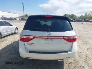 2013 Honda Odyssey Touring with VIN 5FNRL5H96DB009694, listed as a IAAI auction lot 42002487 with 182,867 mi miles and . Bid and sale history available at carsss.com. Image 16.