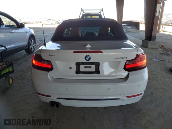 2016 BMW 2 Series 228i with VIN WBA1K9C53GV710823, listed as a Copart auction lot 84087434 with 70,822 mi miles and Salvage Title. Bid and sale history available at carsss.com. Image 6.