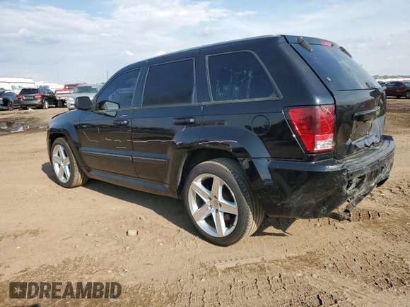 2008 Jeep Grand Cherokee SRT-8 with VIN 1J8HR78308C174606, listed as a Copart auction lot 70313584 with 169,765 mi miles and Salvage Title. Bid and sale history available at carsss.com. Image 2.