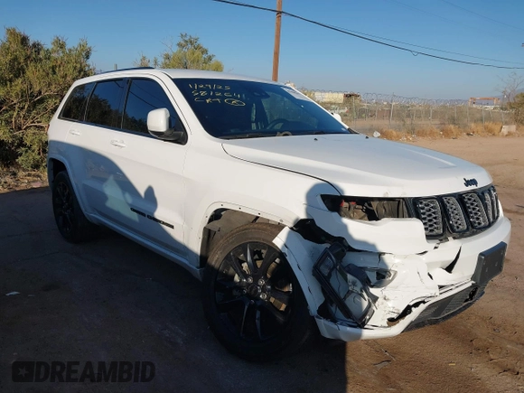 2020 Jeep Grand Cherokee Altitude with VIN 1C4RJEAG1LC251934, listed as a IAAI auction lot 41480299 with 74,169 mi miles and . Bid and sale history available at DreamBid. Image 6.