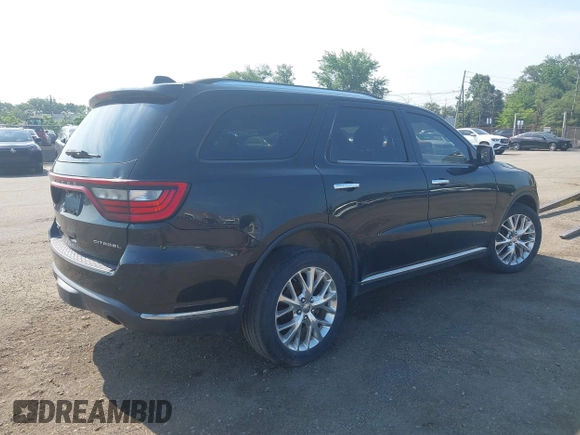2014 Dodge Durango Citadel with VIN 1C4RDJEG0EC537335, listed as a IAAI auction lot 42660446 with 176,791 mi miles and . Bid and sale history available at DreamBid. Image 4.