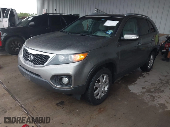 2011 Kia Sorento LX with VIN 5XYKT3A10BG004233, listed as a IAAI auction lot 42477034 with 239,555 mi miles and . Bid and sale history available at DreamBid. Image 2.