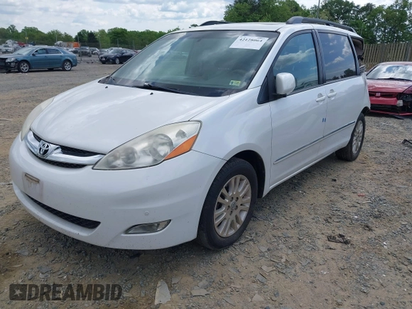 2007 Toyota Sienna XLE with VIN 5TDZK22C57S074123, listed as a IAAI auction lot 42128064 with 184,183 mi miles and . Bid and sale history available at DreamBid. Image 2.