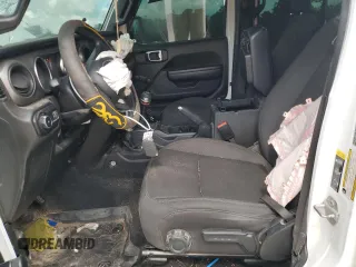 2023 Jeep Wrangler Sport с VIN 1C4HJXDGXPW596127, выставлен на аукционе Copart как лот 56645205 с пробегом 64 257 миль миль и Списание • Salvage title. История ставок и продаж доступна на DreamBid. Изображение 7.