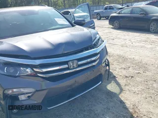 2017 Honda Pilot Touring with VIN 5FNYF5H9XHB046479, listed as a IAAI auction lot 41941449 with 162,554 mi miles. Bid and sale history available at carsss.com. Image 6.