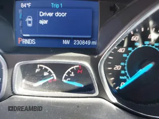 2014 Ford Escape SE with VIN 1FMCU0G99EUA71540, listed as a IAAI auction lot 40651416 with 230,849 mi miles. Bid and sale history available at carsss.com. Image 7.