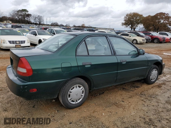 1998 Mitsubishi Mirage DE с VIN JA3AY26A7WU020867, выставлен на аукционе Copart как лот 83889944 с пробегом 203 983 миль миль и Списание • Salvage title. История ставок и продаж доступна на DreamBid. Изображение 3.