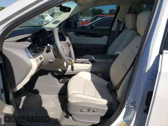 2024 Cadillac XT6 FWD Premium Luxury with VIN 1GYKPCRS4RZ742995, listed as a Copart auction lot 82802774 with 5,898 mi miles and Salvage Title. Bid and sale history available at carsss.com. Image 7.
