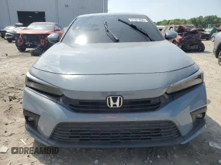 2022 Honda Civic Sedan Touring with VIN 2HGFE1F94NH302242, listed as a Copart auction lot 51201855 with 55,904 mi miles and Non Repairable. Bid and sale history available at carsss.com. Image 5.