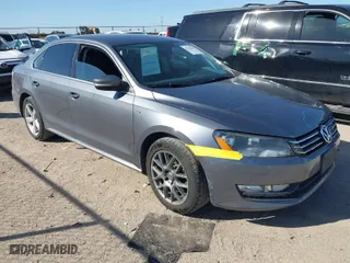 2015 Volkswagen Passat 1.8T S with VIN 1VWAS7A38FC116213, listed as a IAAI auction lot 41749385 with 169,599 mi miles. Bid and sale history available at carsss.com. Image 1.
