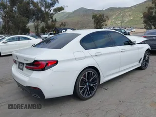 2021 BMW 5 Series 540i z VIN WBA53BJ07MWW92703, wystawiony jako IAAI lot #41868430 z przebiegiem Nie podano mil oraz . Historia ofert i sprzedaży dostępna na DreamBid. Obrazek 4.