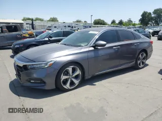 2018 Honda Accord Touring with VIN 1HGCV1F90JA117438, listed as a Copart auction lot 61595355 with 110,440 mi miles and Salvage title. Bid and sale history available at DreamBid. Image 1.