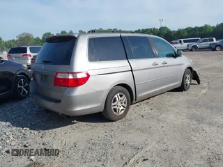 2007 Honda Odyssey EX-L z VIN 5FNRL38757B055931, wystawiony jako IAAI lot #42240198 z przebiegiem 186 954 mil mil oraz . Historia ofert i sprzedaży dostępna na DreamBid. Obrazek 4.