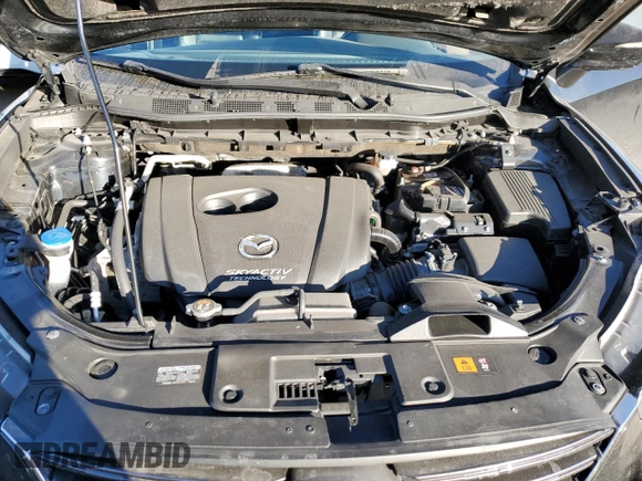 2016 Mazda CX-5 Grand Touring with VIN JM3KE4DY0G0731384, listed as a Copart auction lot 44741695 with 58,727 mi miles and Salvage Title. Bid and sale history available at carsss.com. Image 12.