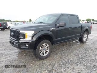 2018 Ford F-150 XL z VIN 1FTEW1CP4JFB01141, wystawiony jako IAAI lot #42703141 z przebiegiem 232 138 mil mil oraz . Historia ofert i sprzedaży dostępna na DreamBid. Obrazek 2.
