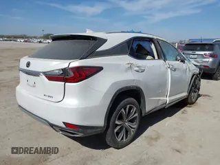 2021 Lexus RX with VIN JTJHZMDA6M2050525, listed as a IAAI auction lot 41788945 with 37,711 mi miles. Bid and sale history available at carsss.com. Image 4.