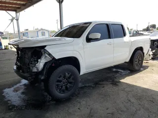 2022 Nissan Frontier SV with VIN 1N6ED1EJ6NN617301, listed as a Copart auction lot 60572395 with 77,269 mi miles and Salvage title. Bid and sale history available at DreamBid. Image 1.