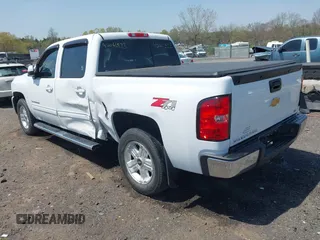 2013 Chevrolet Silverado 1500 LTZ with VIN 3GCPKTE24DG123063, listed as a IAAI auction lot 42061675 with 221,813 mi miles and . Bid and sale history available at DreamBid. Image 3.