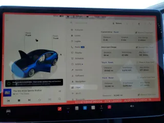 2022 Tesla Model 3 Long Range with VIN 5YJ3E1EB0NF361204, listed as a Copart auction lot 87693415 with 32,042 mi miles and Salvage Title. Bid and sale history available at carsss.com. Image 9.