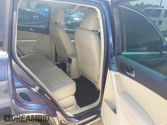2012 Volkswagen Tiguan SE with VIN WVGAV7AX7CW534703, listed as a IAAI auction lot 42463358 with 119,699 mi miles and . Bid and sale history available at DreamBid. Image 8.