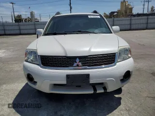 2011 Mitsubishi Endeavor LS with VIN 4A4JN2AS3BE013213, listed as a Copart auction lot 66189634 with 176,086 mi miles and Salvage Title. Bid and sale history available at carsss.com. Image 5.