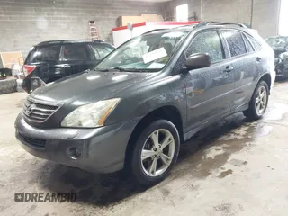 2007 Lexus RX 400h z VIN JTJGW31U172001122, wystawiony jako IAAI lot #42335831 z przebiegiem 232 699 mil mil oraz . Historia ofert i sprzedaży dostępna na DreamBid. Obrazek 2.