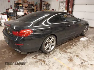 2012 BMW 6 Series 650i xDrive with VIN WBALX5C57CC894205, listed as a IAAI auction lot 41591874 with 110,932 mi miles. Bid and sale history available at carsss.com. Image 4.
