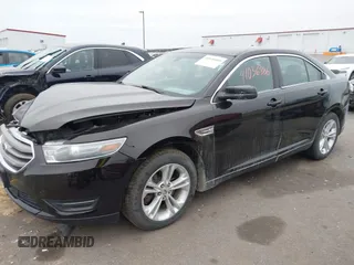 2014 Ford Taurus SEL z VIN 1FAHP2E85EG121636, wystawiony jako IAAI lot #41036886 z przebiegiem 117 460 mil mil oraz . Historia ofert i sprzedaży dostępna na DreamBid. Obrazek 2.